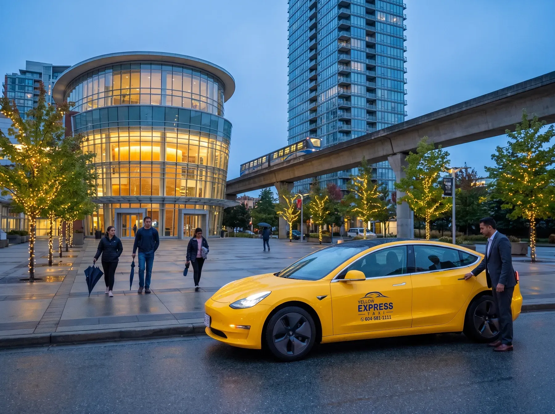 A Yellow Express taxi at Surrey City Centre at dusk, a SkyTrain passing on the guideway behind
