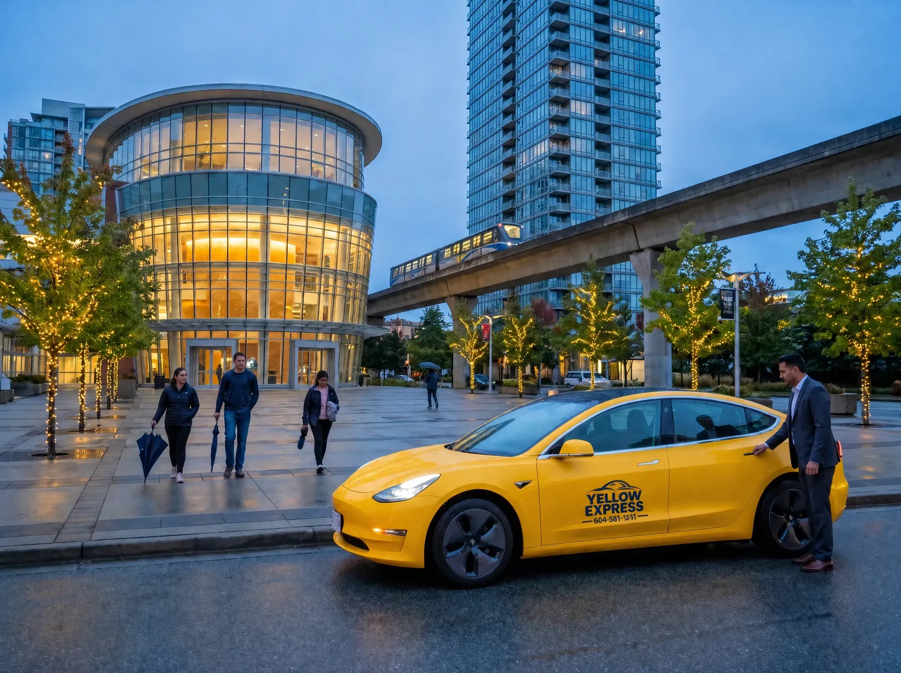 A Yellow Express taxi at Surrey City Centre at dusk, a SkyTrain passing on the guideway behind